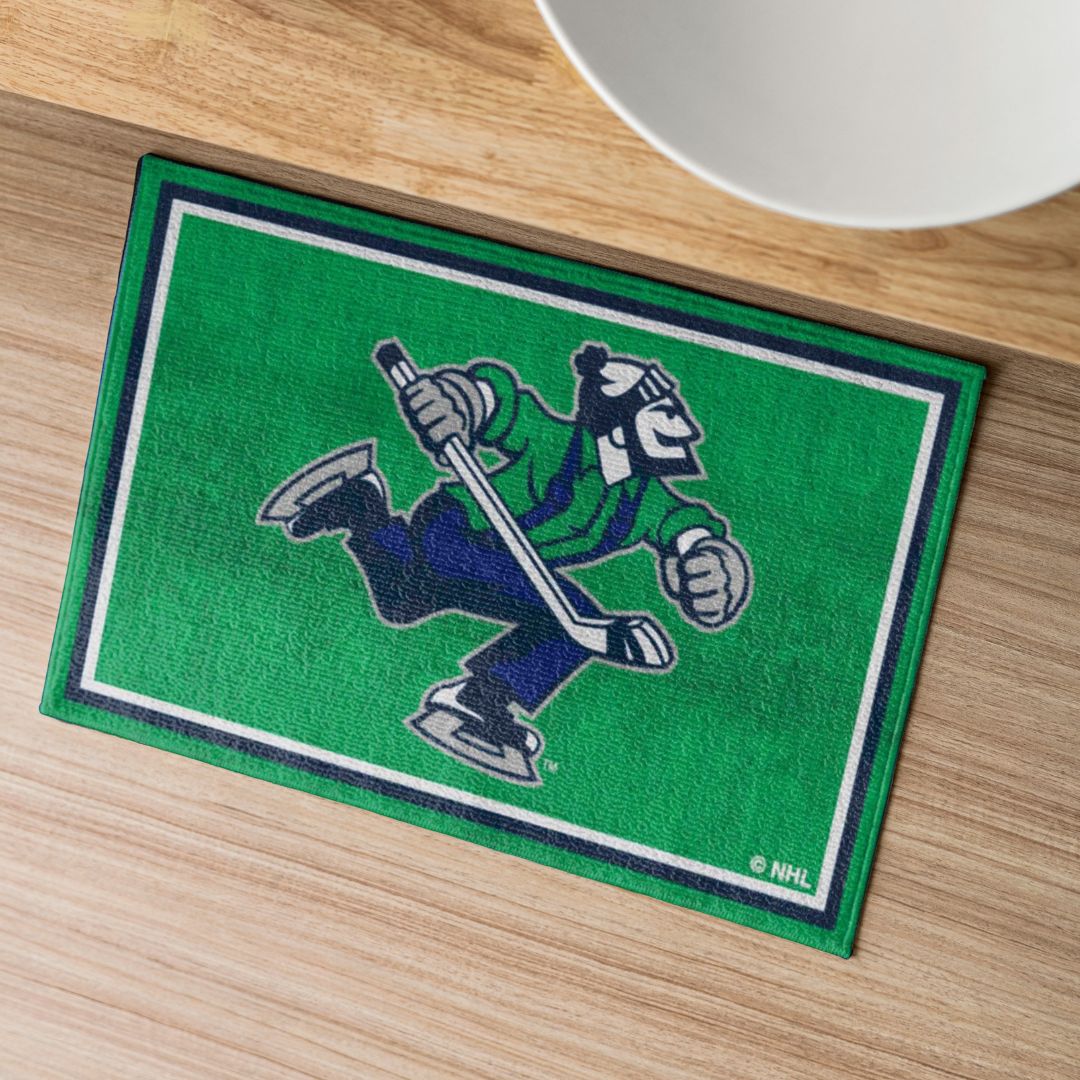 Canucks Area Rug